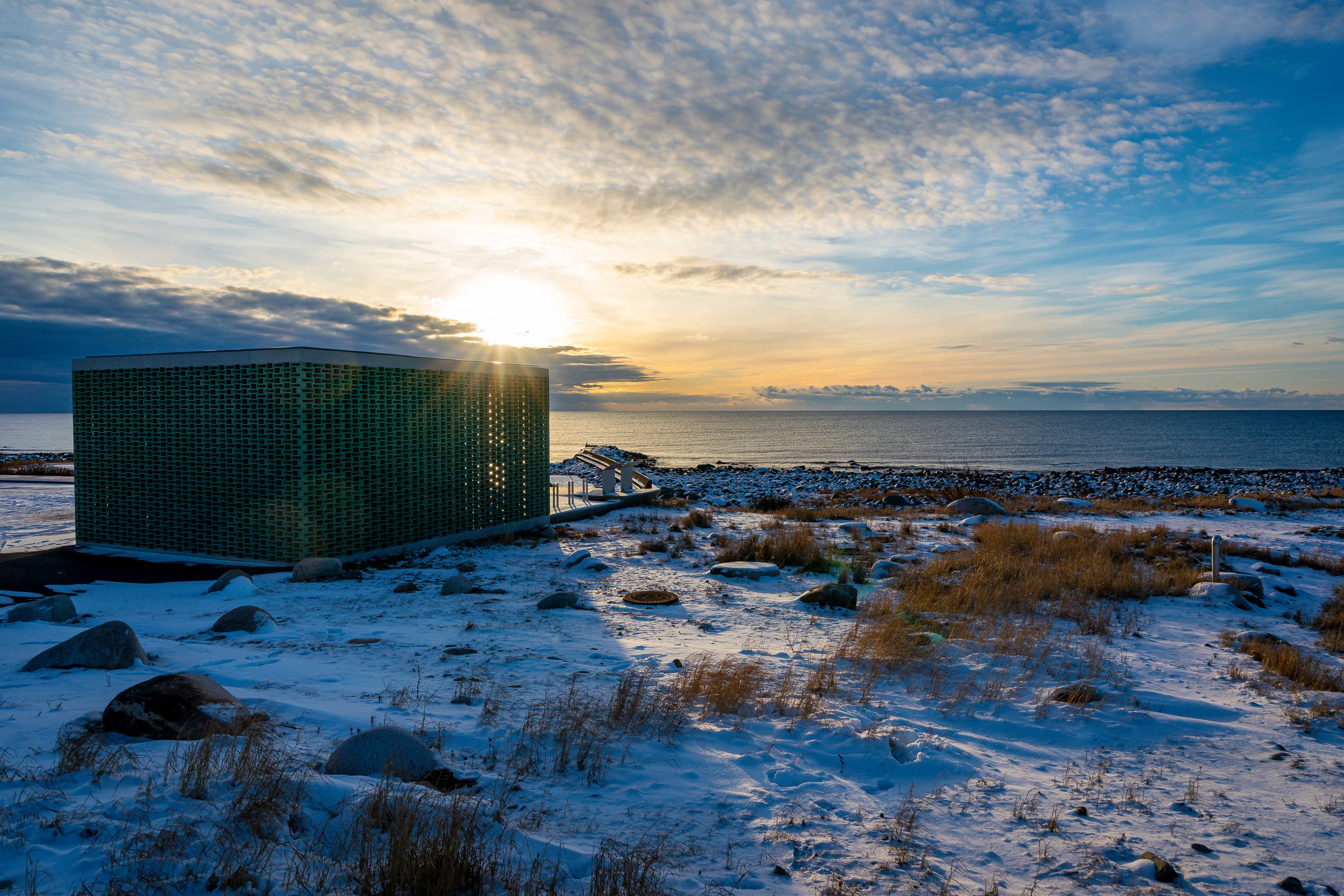 madland harbour in sunset and in winter with snow