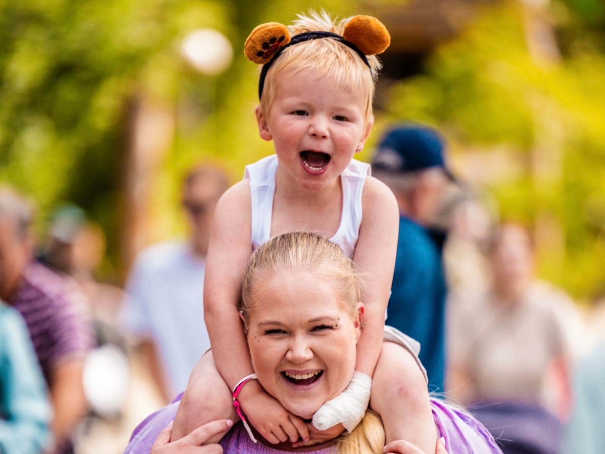 Kongeparken family and amusement park, families having fun on rides etc